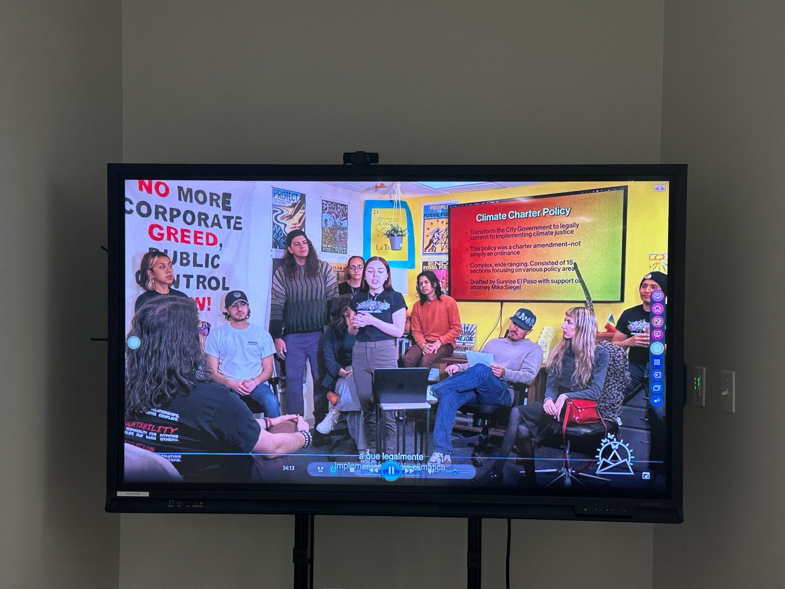 Community sustainability panel displayed on a gallery screen