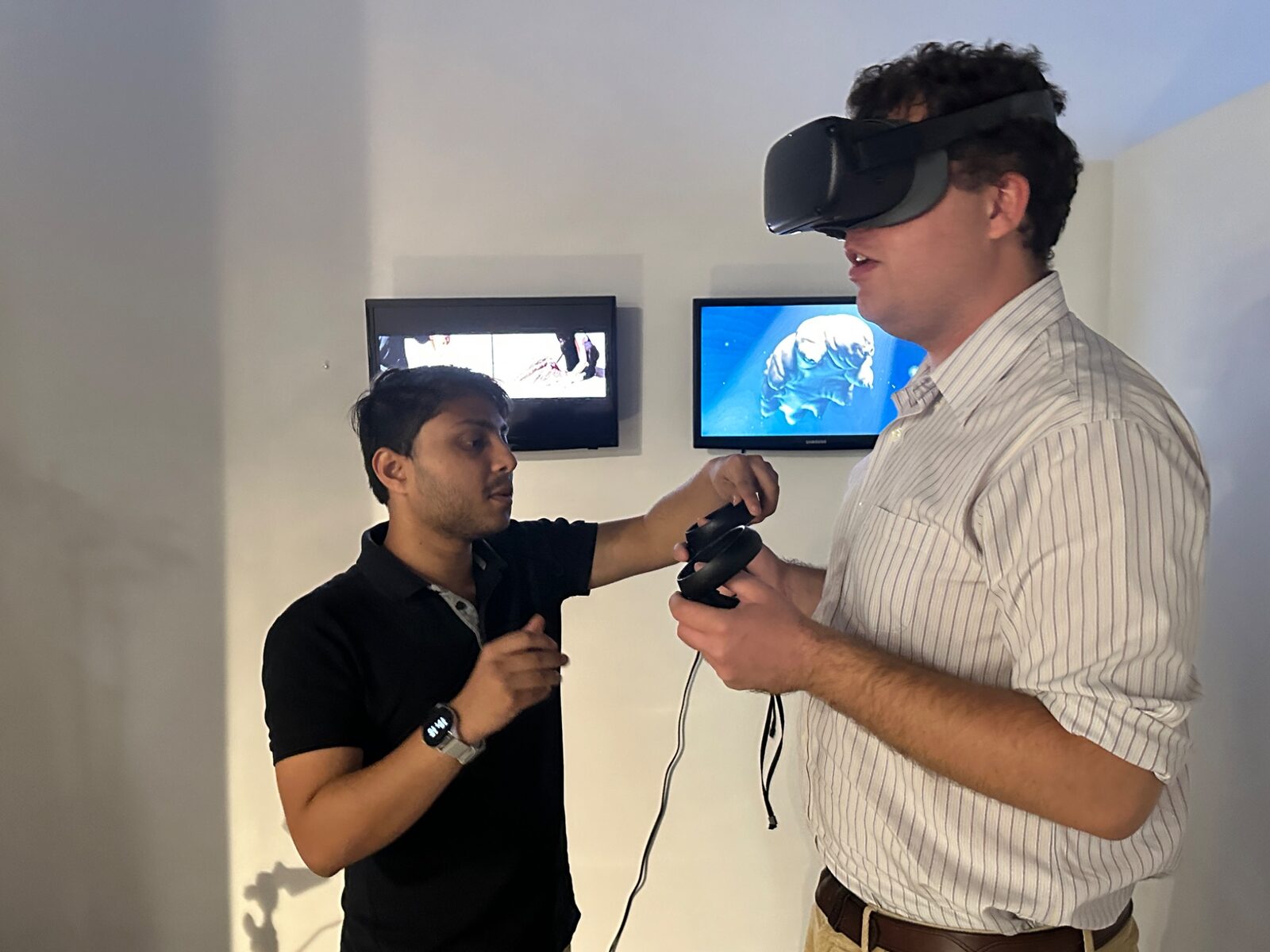 Visitors experiencing a virtual-reality work