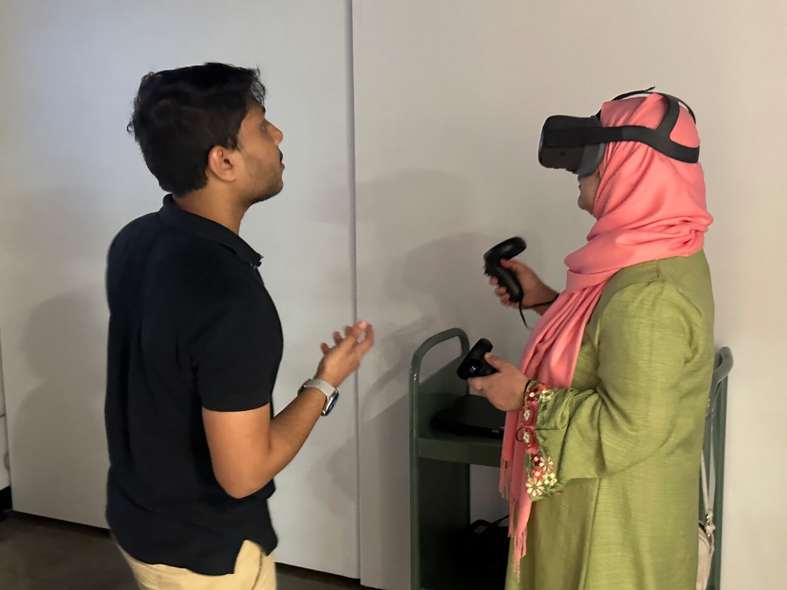Two visitors participating in a virtual-reality experience