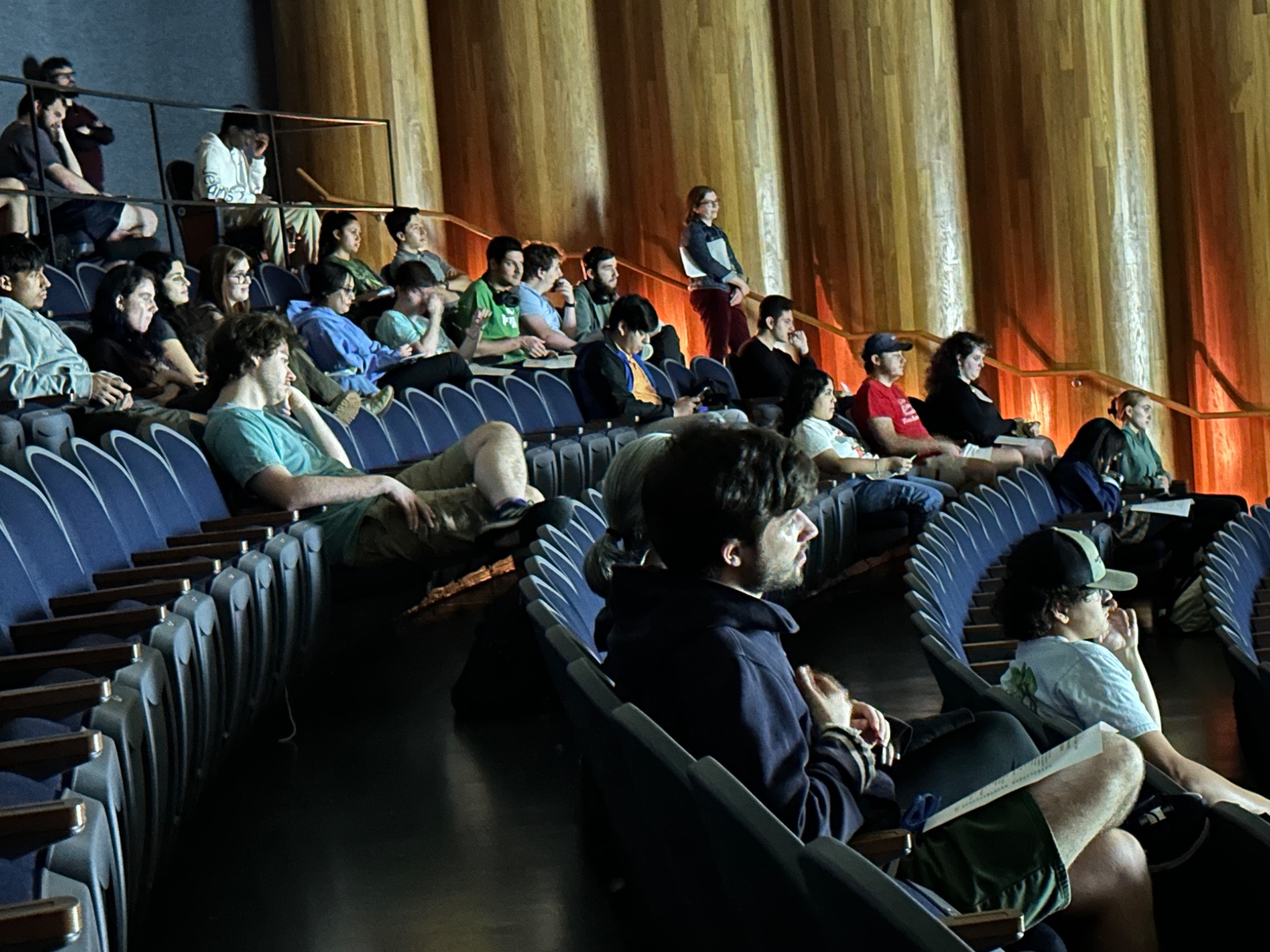 Audience members watching a Sustainable Stories screening in the Alvin College Theater